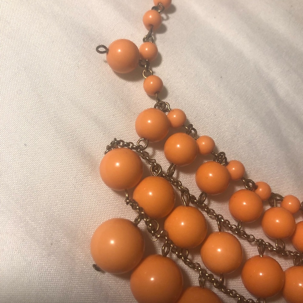 Salmon pink ball necklace